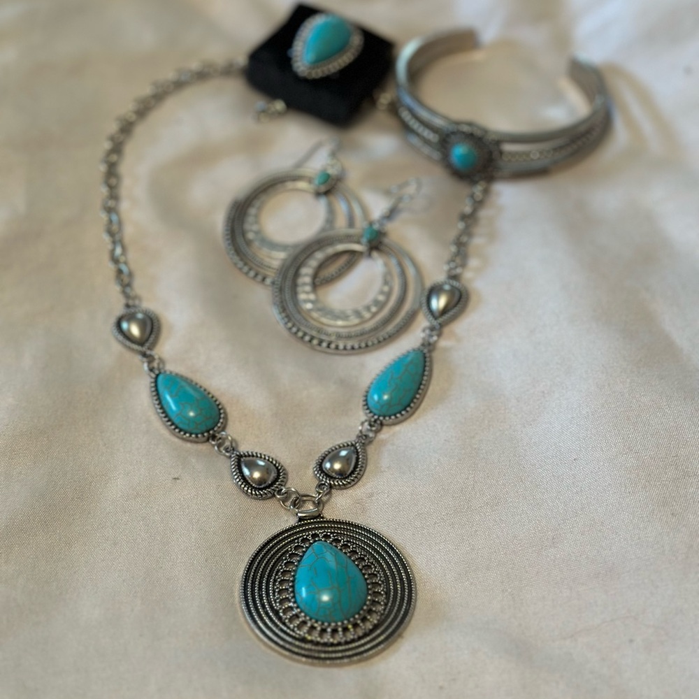 Turquoise and silver 4 piece set.